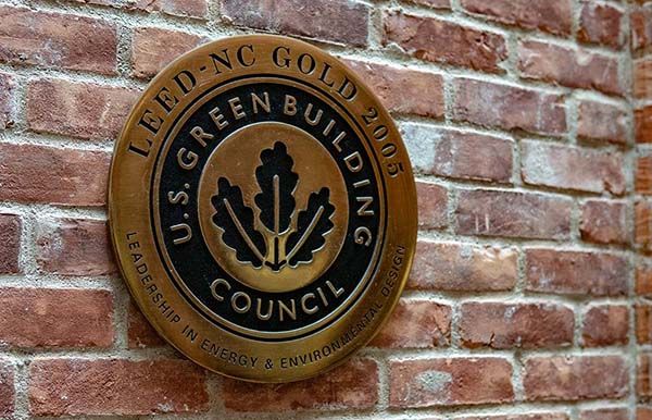 LEED Gold plaque on a brick wall