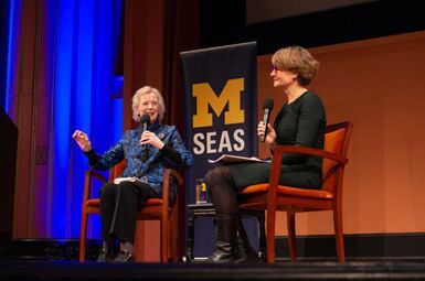 Mary Robinson (left) talks with Provost Laurie McCauley during the 21st Annual Peter M. Wege Lecture on Sustainability. (Photo by Dave Brenner, SEAS)