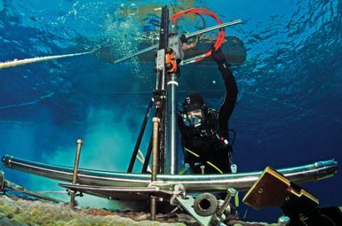 Hydraulic coral coring. Image credit: Eric Matson, Australian Institute of Marine Science