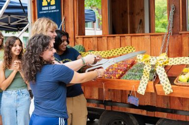 student workers at the farm stand