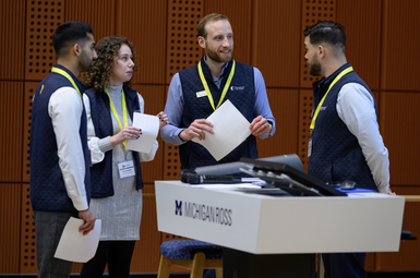 The ClimateCAP Summit planning committee delivered the opening remarks on February 9, 2024. From left: Nikhil Khurana (MBA ’24), Sarah Cohen (MBA ’24), Alex Reid (MS/MBA ’24) and Nick Rojas (MS/MBA ’24).