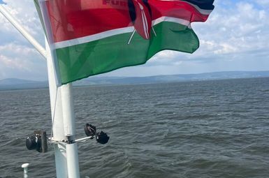 The Kenyan flag flies aboard a vessel used to sample different sites across Lake Victoria’s Winam Gulf for different types of cyanobacteria.