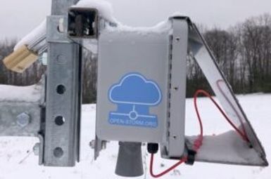 The setup at UMBS uses a low-cost sonic rangefinder to monitor the distance between the bottom of the sensor and the ground beneath it. As snow accumulates, that distance will decrease — giving the snow-depth data.