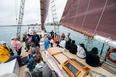The schooner Inland Seas takes Detroit and other students on a sail along the Detroit River. Students, along with some help from staff and volunteers, conduct scientific tests, and learn about local history. Image credit: Eric Bronson, Michigan Photography