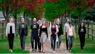 Erb Environmental students walking outdoors during fall.
